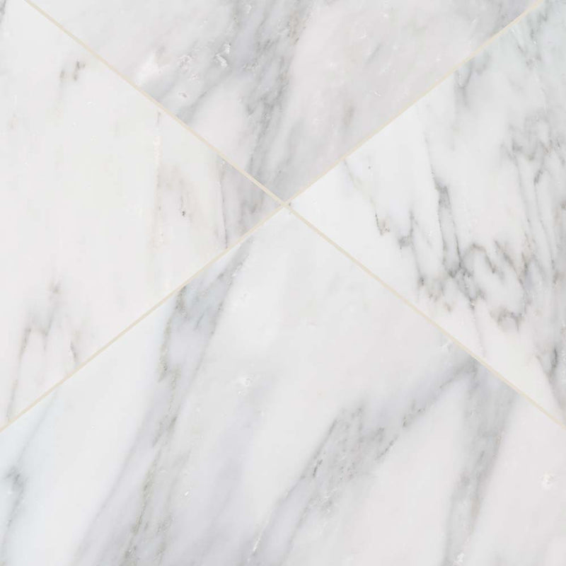 Arabescato carrara 18 x 18 honed marble floor and wall tile TARACARRA612 product shot multiple tiles angle view