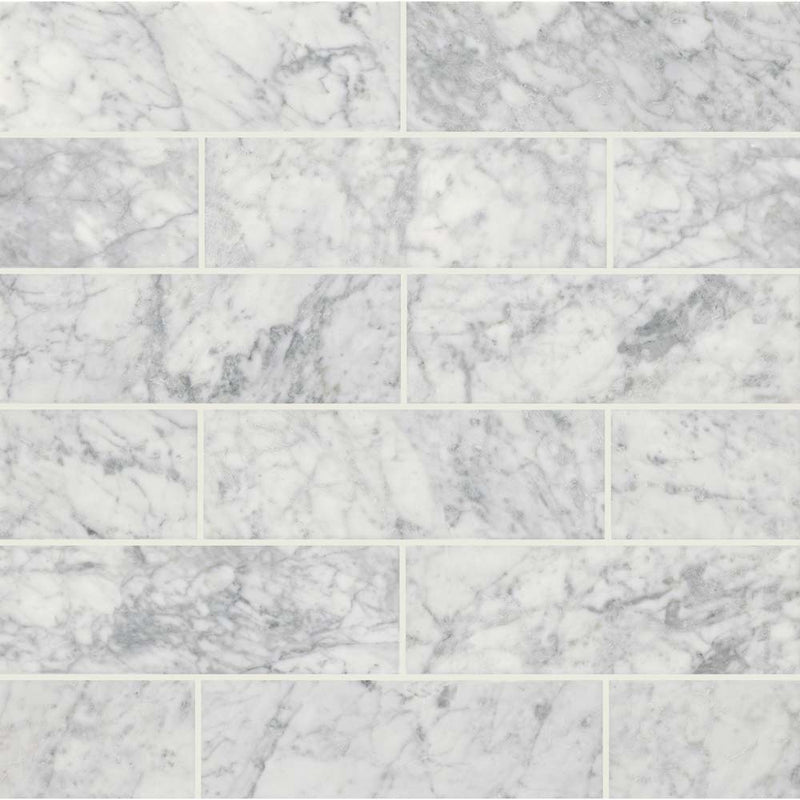 Arabescato carrara 4 x 12 honed marble floor and wall tile TARACAR412H product shot multiple tiles top view