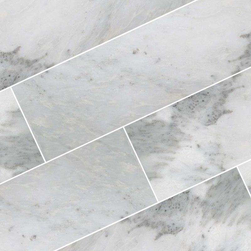 Arabescato carrara 6 x 24 polished marble floor and wall tile TARACAR6240.38P product shot multiple tiles angle view