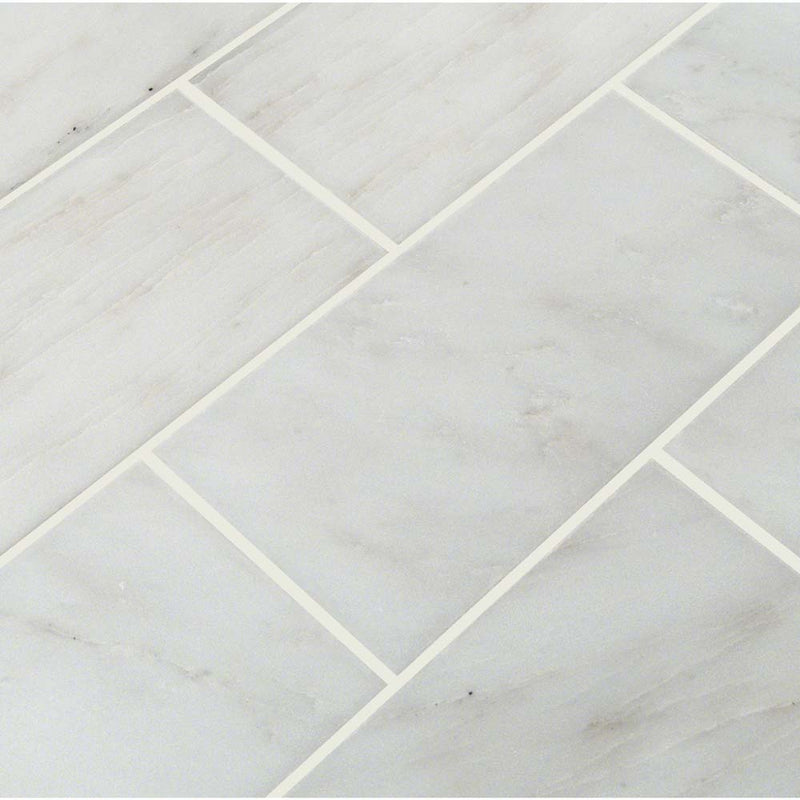 Arabescato carrara beveled 3 x 6 honed marble floor and wall tile TARACAR36H product shot multiple tiles top view