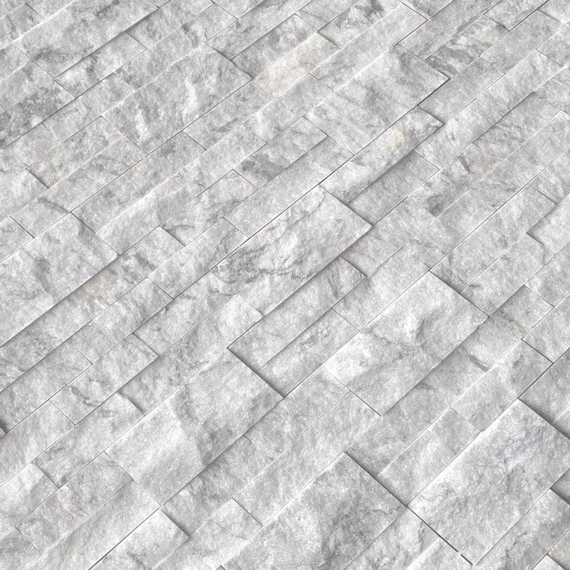 Arabescato carrara splitface ledger panel 6X24 natural marble wall tile LPNLMARACAR624 product shot multiple tiles angle view
