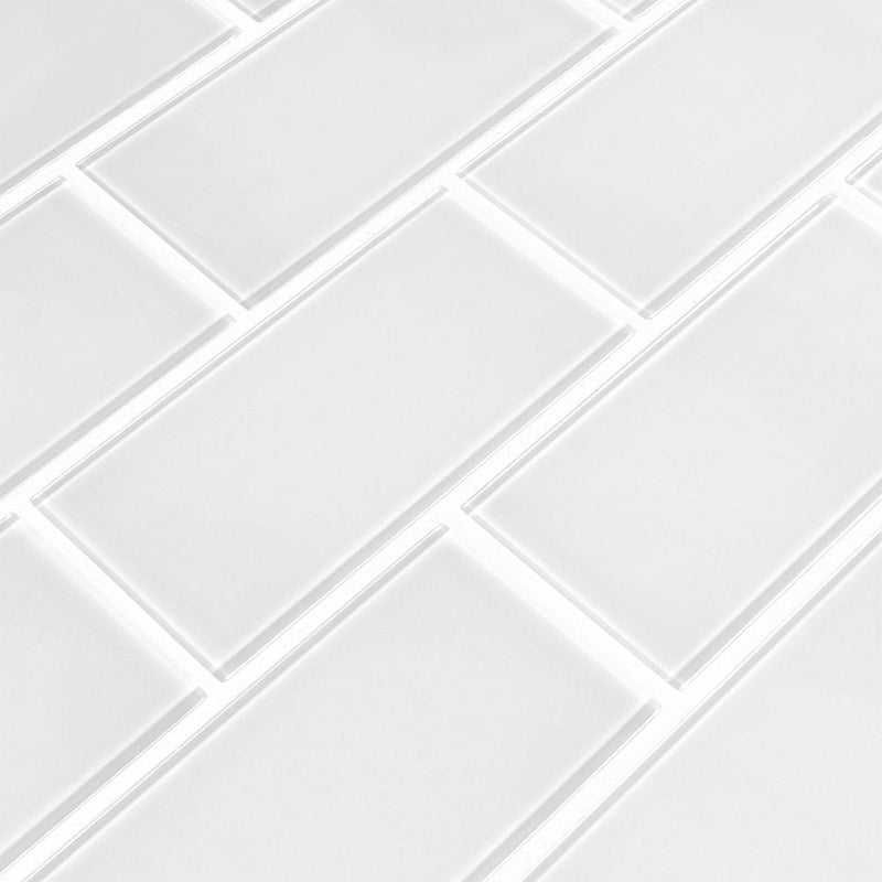 Arctic ice 3x6 glossy glass white subway tile SMOT GL T AI36 product shot multiple tiles angle view