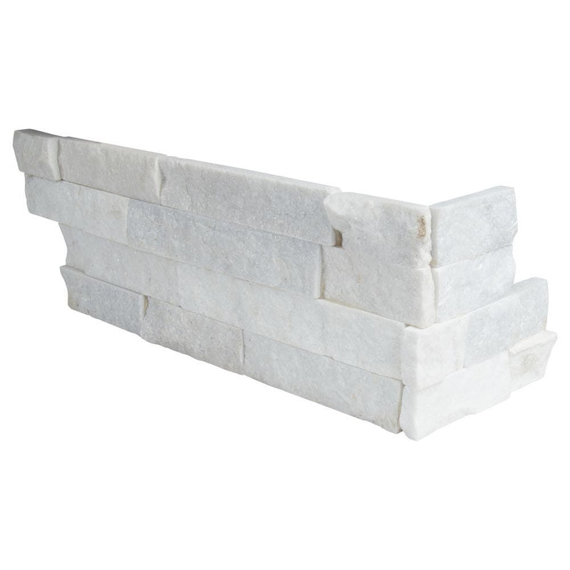 Arctic white splitface ledger corner 6X18 natural marble wall tile LPNLQARCWHI618COR product shot multiple tiles close up view