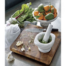Bianco Carrara genuine white marble mortar pestle kitchen shot avakados, garlic, tangerines