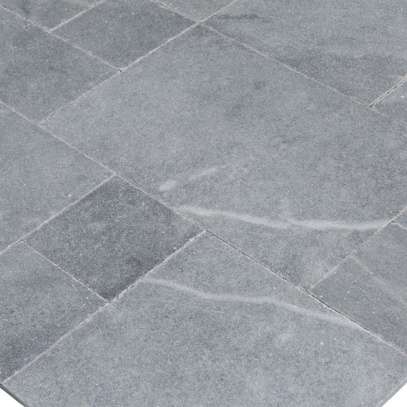 Bluestone marble outdoor tile pattern brushed sand blasted 40040106 angle view closeup