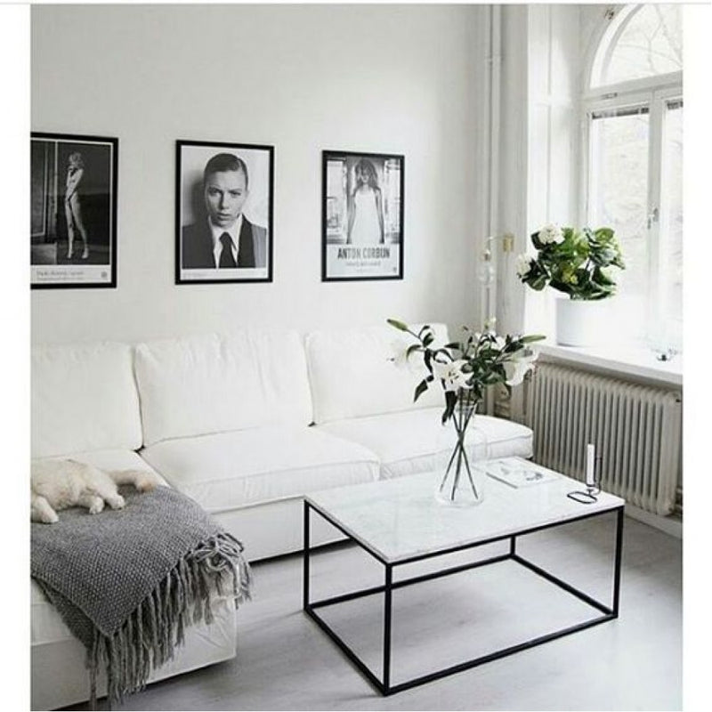 Carrara White marble coffee table 20x40 black paint legs living room view