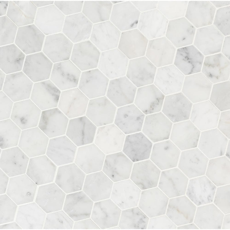 Carrara white hexagon 11.75X12 honed marble mesh mounted mosaic tile SMOT-CAR-2HEXH product shot multiple tiles angle view