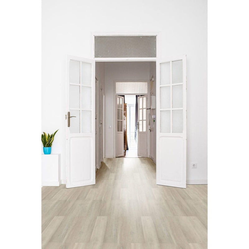 Coastal oak rigid core luxury vinyl plank flooring 7x48 SPC13020748-22M installed to hallway of high ceiling house