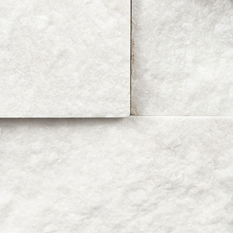 Cosmic white ledger corner 6"x18" splitface marble wall tile LPNLMCOSWHI618COR product shot top view