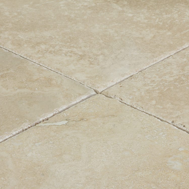 Denizli Beige travertine tile 18x18 10083369 brushed chiseled angle closeup