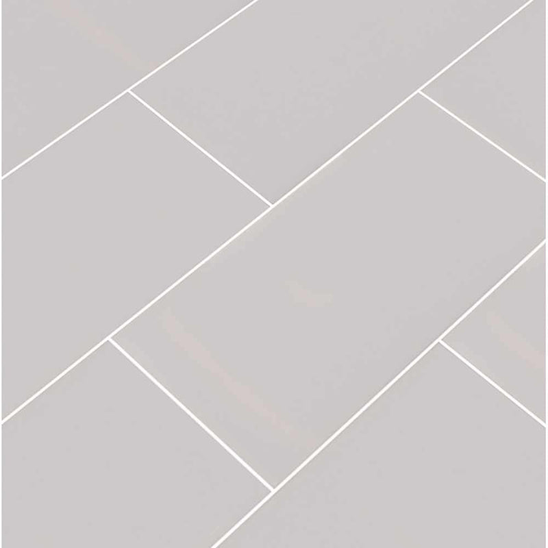Gray glossy glazed ceramic wall tile msi collection NGRAGLO3X6 product shot multiple tiles angle view_a009204b e892 4ff9 8ab0 952414282a77