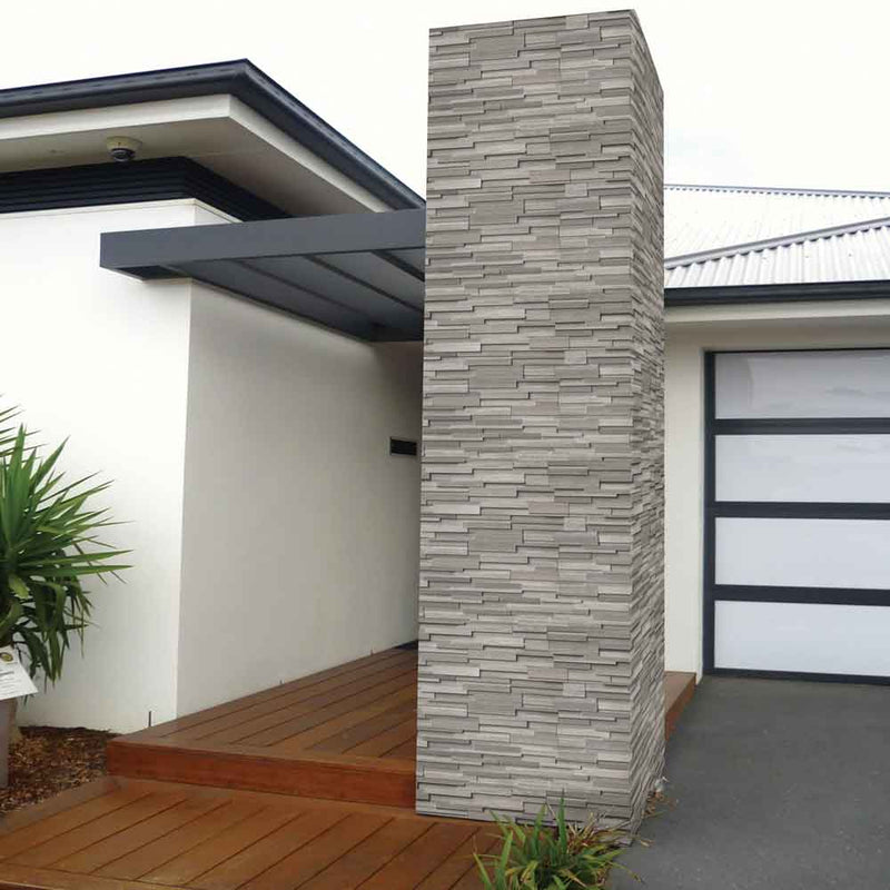 Gray oak split face ledger panel 6X24 marble wall tile LPNLMGRYOAK624 product shot outdoor view