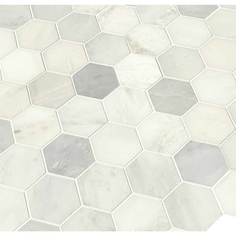 Greecian white hexagon 11.85X12.84 polished marble mesh mounted mosaic tile SMOT GRE 3HEXP product shot multiple tiles angle view