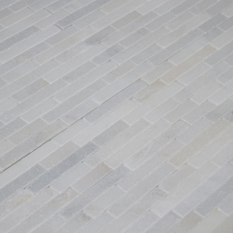 Greecian white veneer 8X18 tumbled marble mesh mounted mosaic tile SMOT-VNR-GRE-T product shot multiple tiles angle view