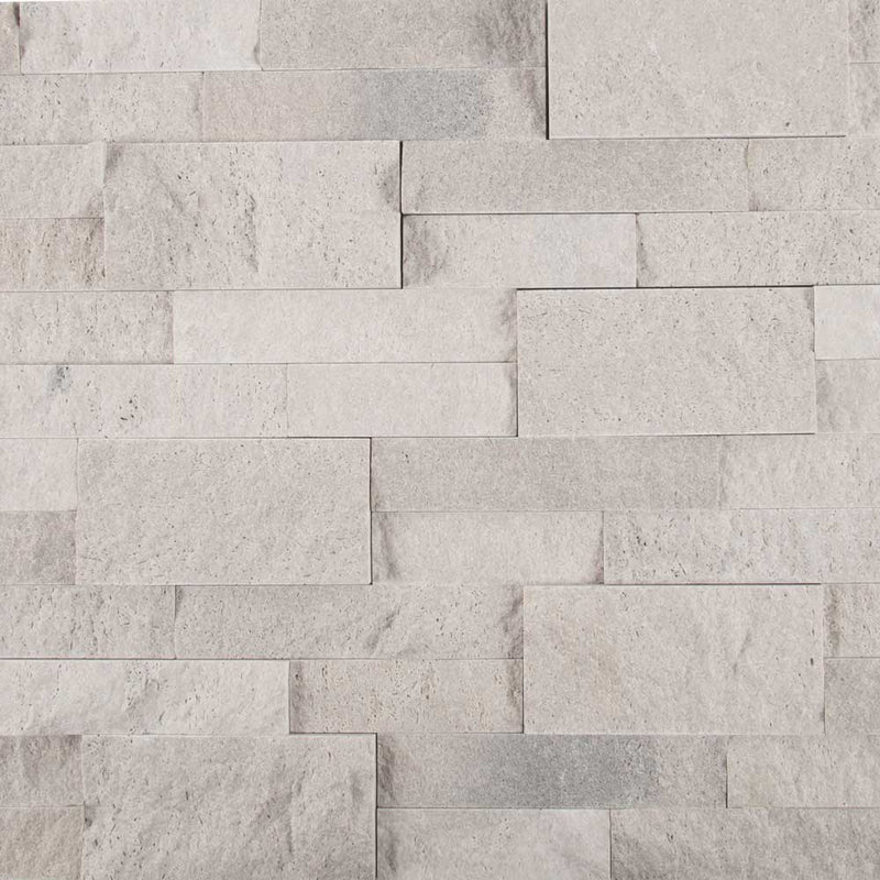 Iceland gray splitface ledger panel 6X24 natural travertine wall tile LPNLTICEGRY624 product shot multiple tiles top view