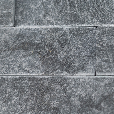 Rockmount glacial grey splitface lpnlmglagry618cor ledger corner 6"x18" natural marble wall tile msi collection product shot wall view