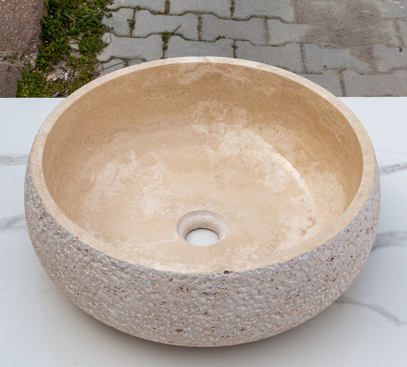 https://villohome.com/cdn/shop/products/Light-beige-travertine-vessel-sink-polsihed-inside-rough-outside-EGELBTR1662-D-16-H6-angle-view2_800x.jpg?v=1688814200