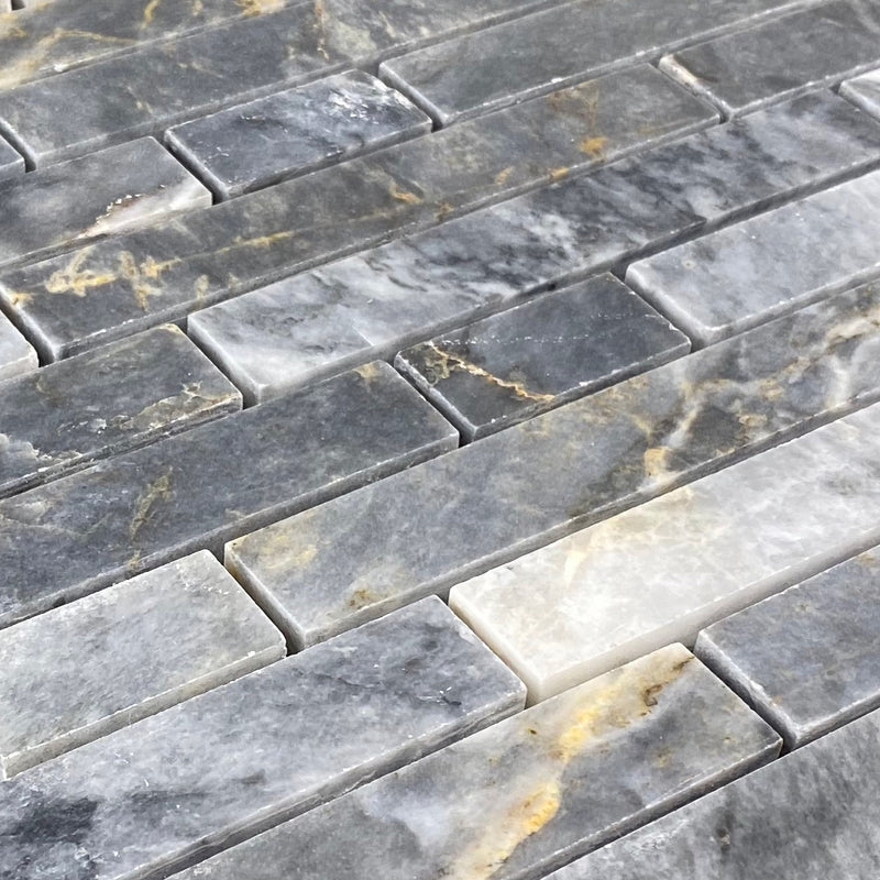 Luna sky marble mosaic liner on 12x12 mesh brick honed profile view