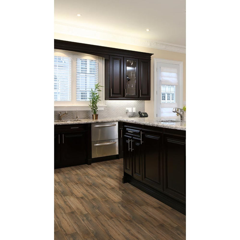 MSI Wood Collection botanica cashew 6x24 glazed porcelain floor wall tile room shot kitchen with dark cabinets and modern appliances