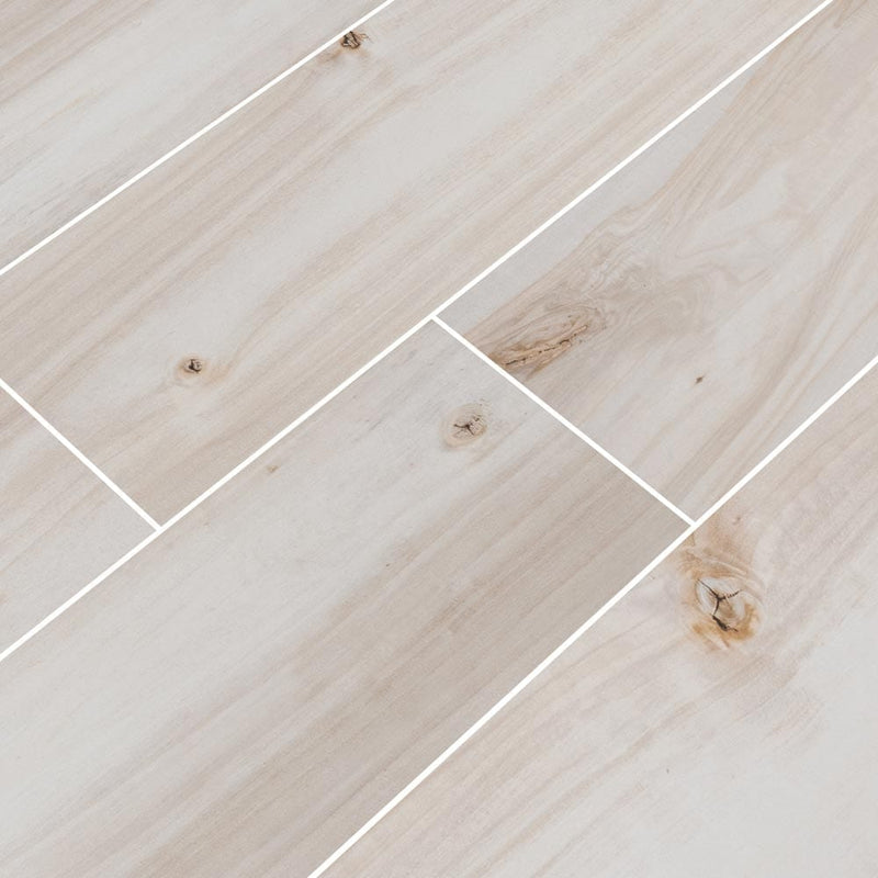 MSI Wood Collection havenwood dove 8x36 glazed porcelain floor wall tile NHAVDOV8X36 product shot multiple planks angle view