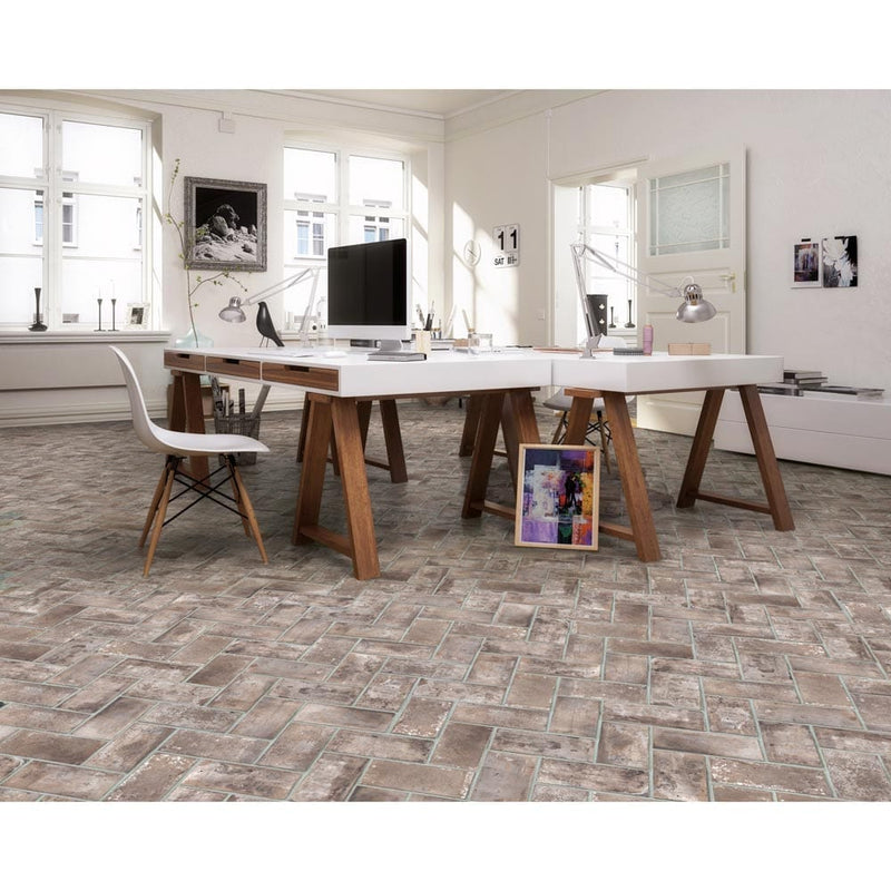 MSI brick collection capella taupe brick NCAPTAUBRI5X10 glazed porcelain floor wall tile installed on a modern office floor