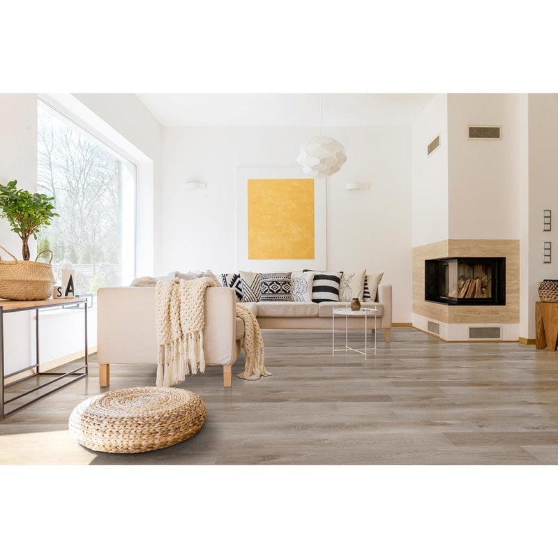 MSI everlife cyrus whitfield gray rigid core luxury vinyl plank flooring VTRWHTGRA7X48-5MM-12MIL installed on a living room with a modern fireplace
