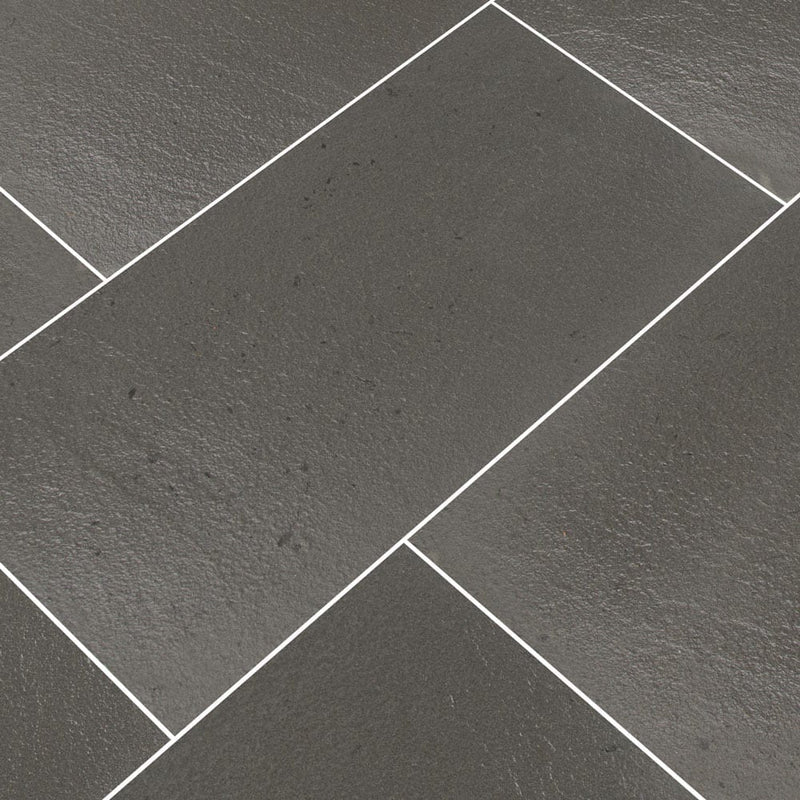 Mountain bluestone sandstone pavers 12x24x1in flamed floor tile LPAVDMOUBLU1224FL multiple tiles angle view