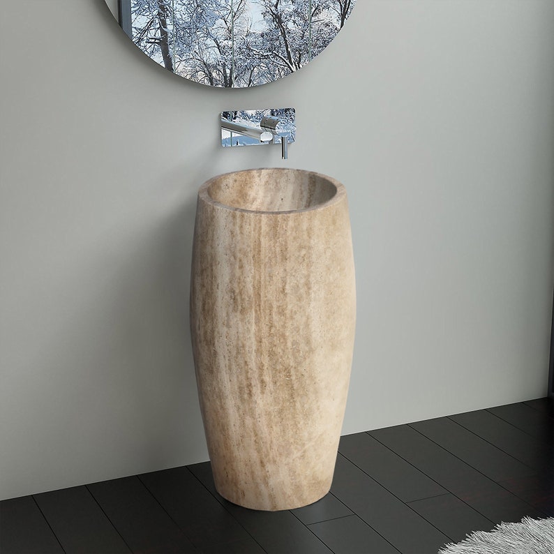 Walnut Travertine Pedestal Stand-alone Sink Curved Honed (W)16" (L)19.5" (H)33.5" installed bathroom black tiles and shiny chrome wall-mount faucet