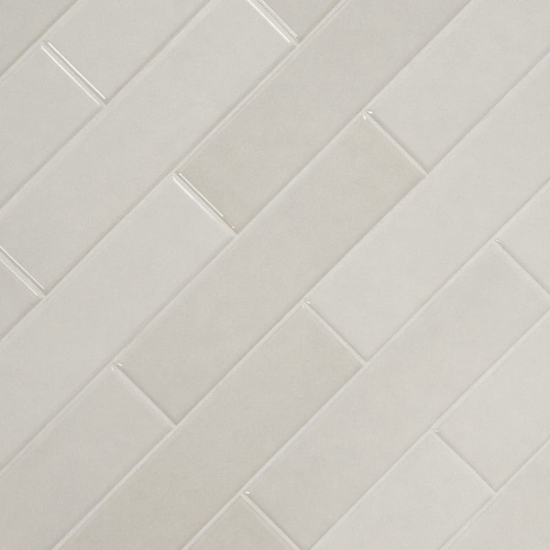 Renzo dove 3x12 glossy ceramic white wall tile NRENDOV3X12 product shot multiple tiles angle view
