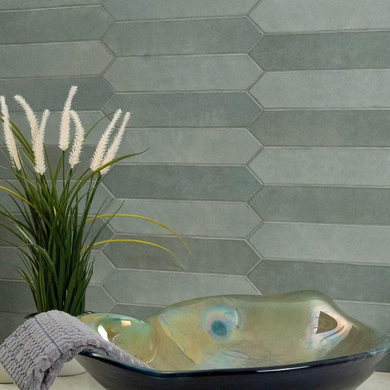 Renzo jade pickett 2.5x13 glossy ceramic green wall tile NRENJADPICK2.5X13 product shot multiple tiles living room wall view 1