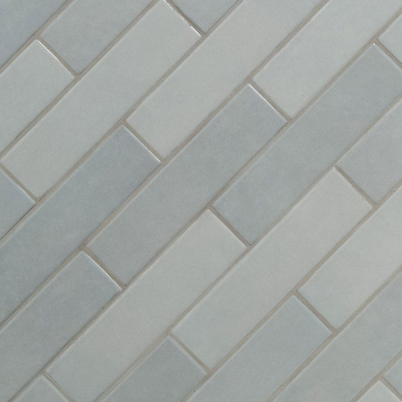 Renzo sky 3x12 glossy ceramic blue wall tile NRENSKY3X12 product shot multiple tiles angle view