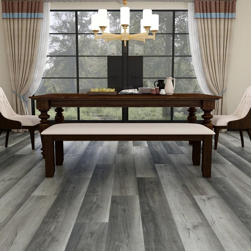 Rigid-core-vinyl-planks-9x59-SPC-island-tundra-gray-5.2mm-20mil-wear-layer-1520308-isntalled-on-dining-room-floor
