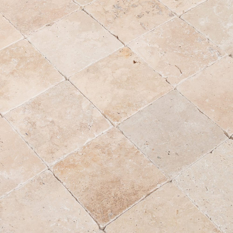 Riverbed travertine tile walnut 10087867 4x4 tumbled product shot angle closeup