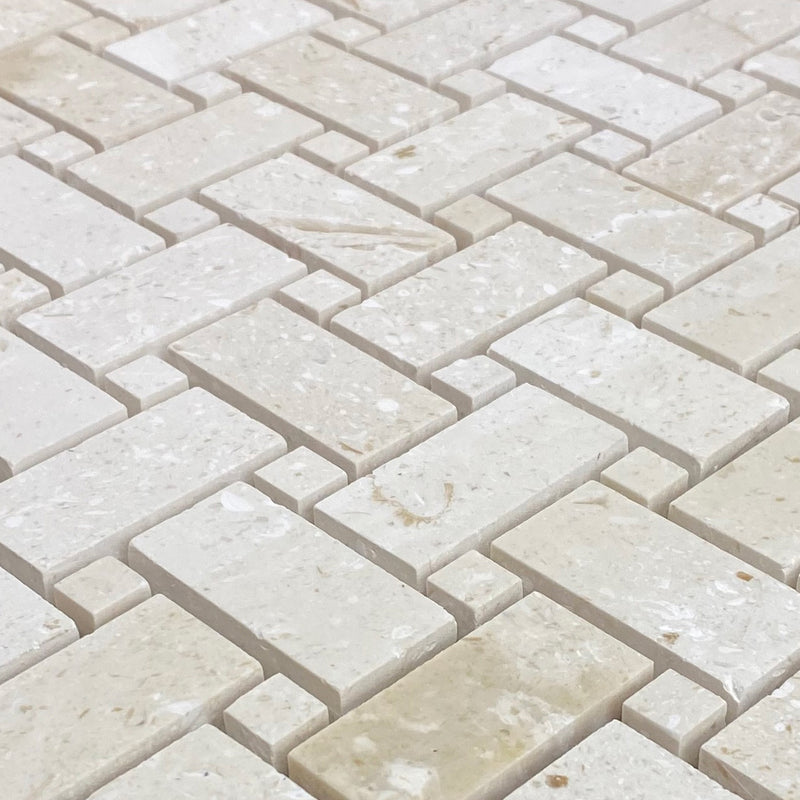 Shell stone limestone mosaic tile basketweave on 12x12 mesh honed angle closeup view