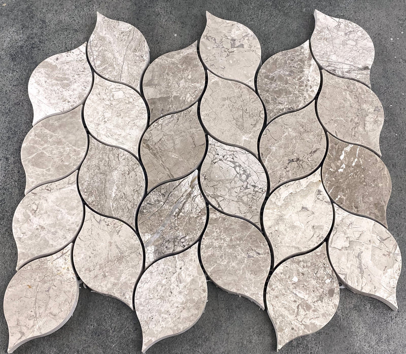 https://villohome.com/cdn/shop/products/Silver-shadow-marble-mosaic-tile-leaf-design-on-12x12-mesh-honed-top-view_800x.jpg?v=1655814563
