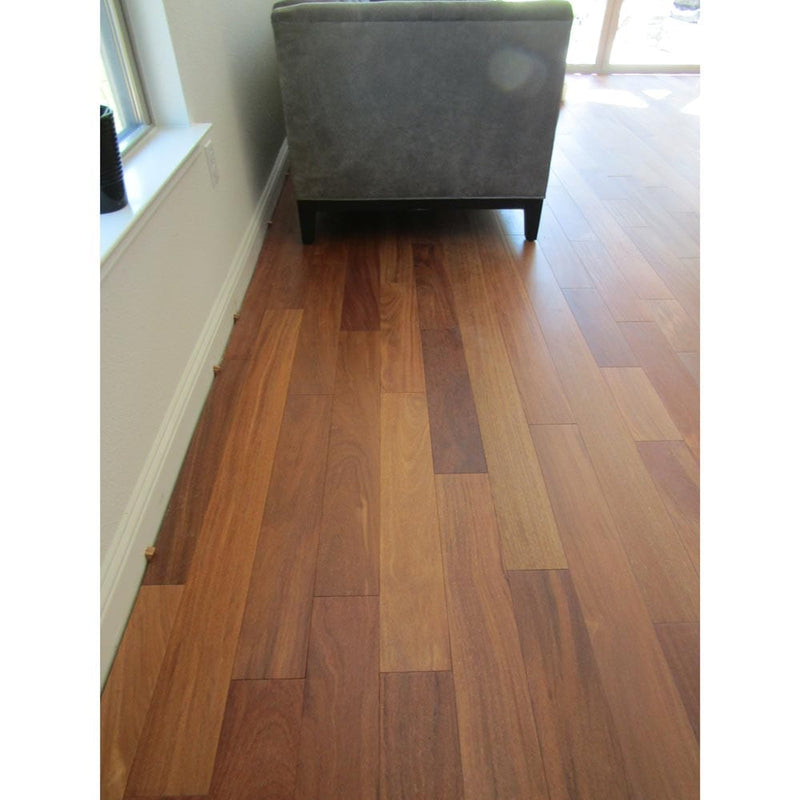 Solid Hardwood Floors Brazilian Teak Cumaru Pre-finished 5 premium Collection SHWSAC237 installed on living room floor gray color couch