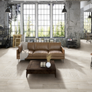 Stoffa cotton rectified 24x24 matte porcelain flore tile florim us collection room shot living room view