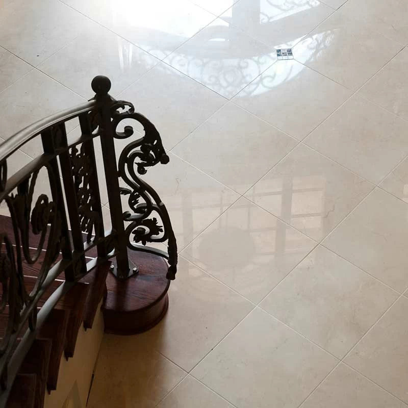 Crema Marfil 12"x12" Polished Marble Tile product shot staircase view 2
