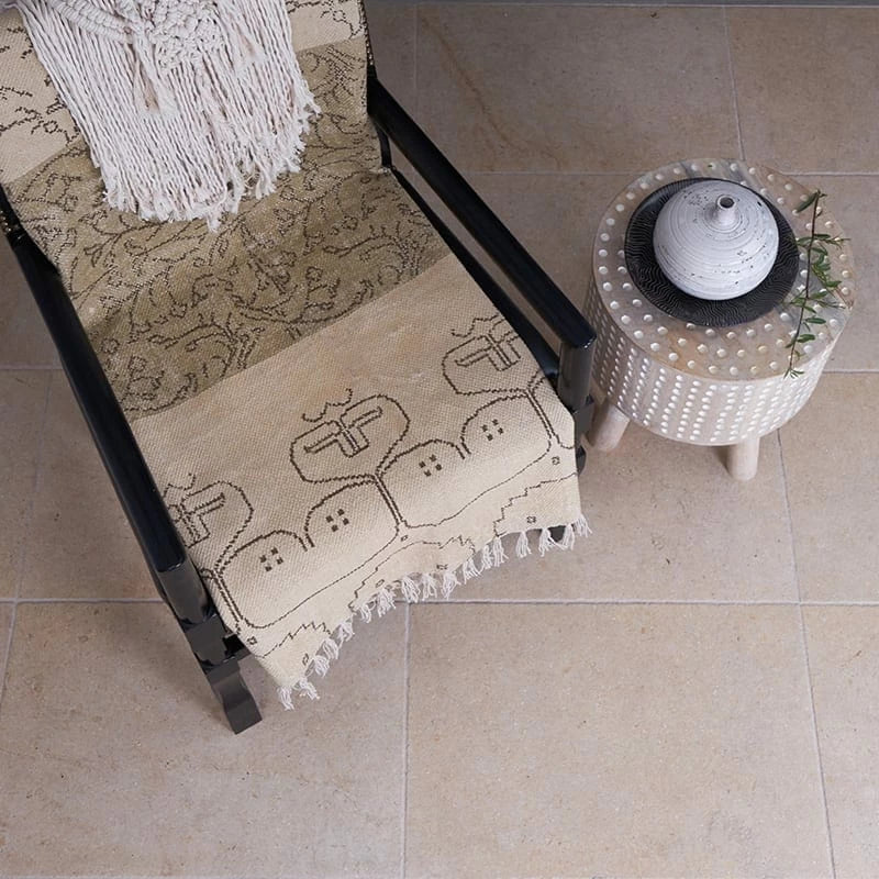 Ocean Cottage 16"x24" Limestone Tile product shot sofa view 2