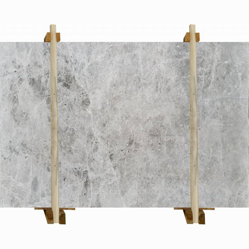 Tundra Grey marble slabs polished packed on wooden bundle product shot