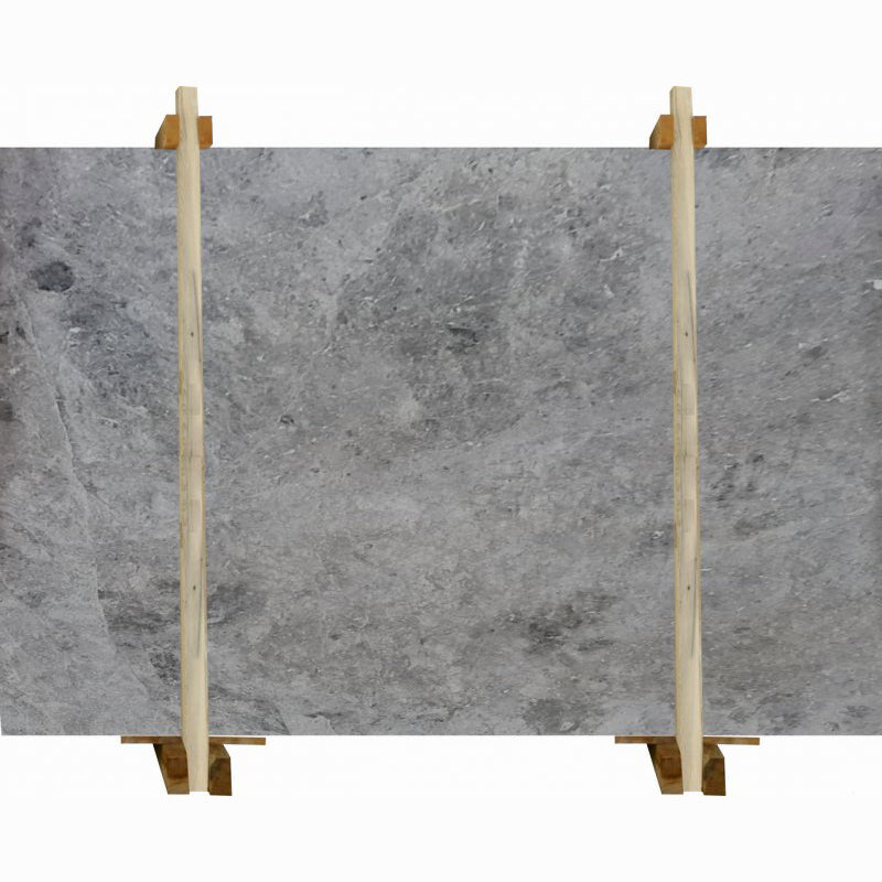 Tundra Grey marble slabs polished packed on wooden bundle product shot