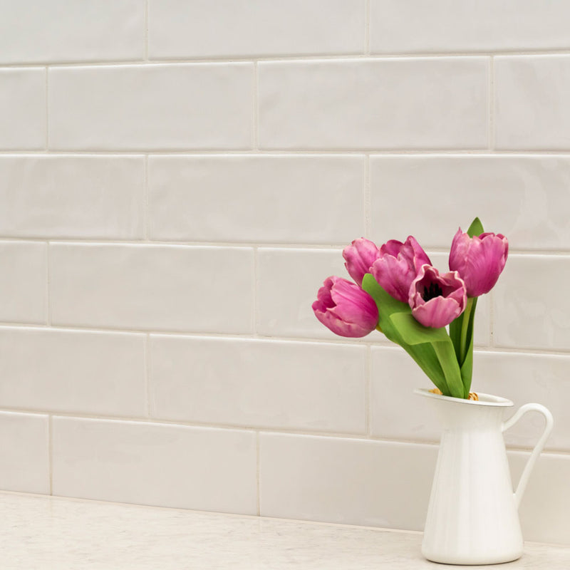 Urbano crema ceramic white subway tile 4x12 glossy  msi collection NURBCRE4X12 product shot table view 2