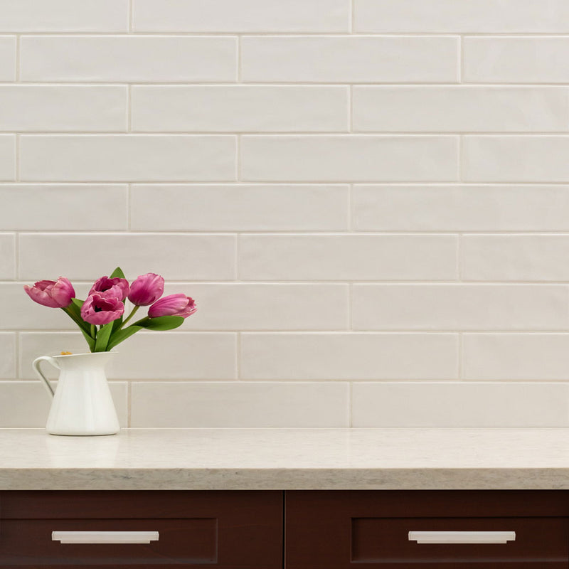 Urbano crema ceramic white subway tile 4x12 glossy  msi collection NURBCRE4X12 product shot table view 3
