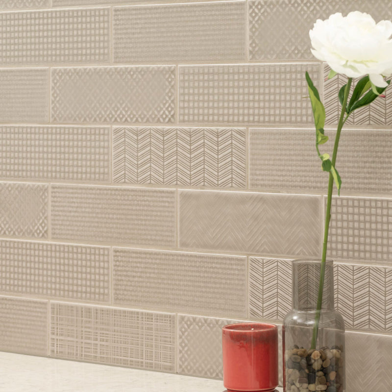 Urbano warm concrete 3d mix ceramic gray textured subway tile 4x12 glossy NURBWARCONMIX4X12 room shot table view 2