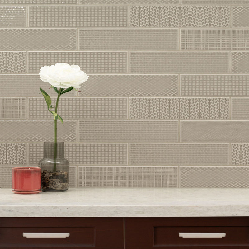 Urbano warm concrete 3d mix ceramic gray textured subway tile 4x12 glossy NURBWARCONMIX4X12 room shot table view 3