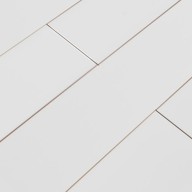 White glossy 4x12 glazed ceramic wall tile msi collection NWHIGLO4X16 product shot multiple tiles angle view
