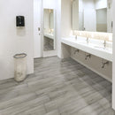 Xl cyrus dunite oak 9x60 rigid core luxury vinyl plank flooring VTRXLDUNO9X60-5MM-12MIL room shot restroom view