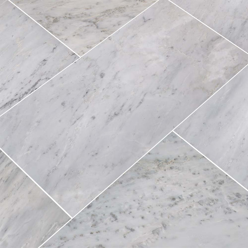 Arabescato carrara 12 x 24 polished marble floor and wall tile TARACAR12240.38P product shot multiple tiles angle view