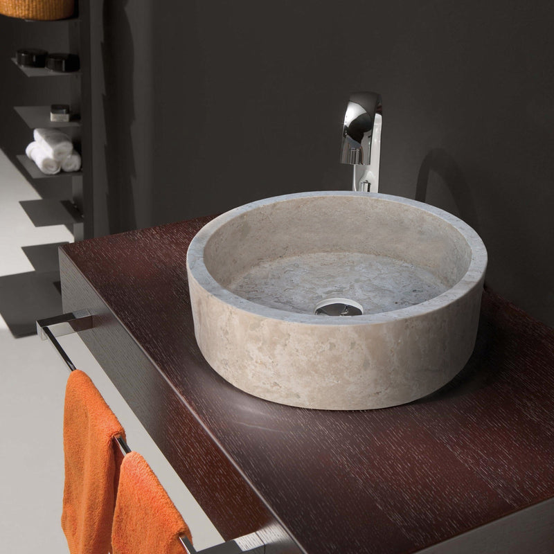 beige travertine vessel sink d16 h6 TMS6 bathroom viewNatural Stone Beige Travertine Above Vanity Bathroom Sink Honed (D)16" (H)6" installed above dark wooden vanity orange hand-towels chrome faucet