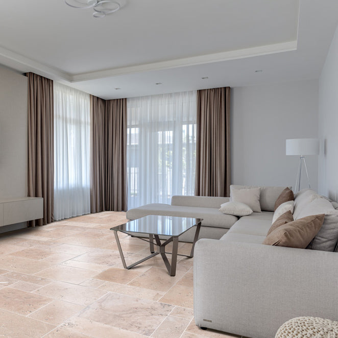 classic beige travertine tiles antique pattern tumbled CBLTAPTUM installed living room floor closeup